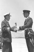 Primera imagen del registro Señor Edelberto Rousseau recibe un Premio, hace entrega el Señor Armando Cortinez